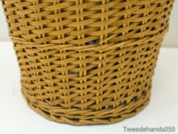 Handwoven basket in warm tones, perfect for stylish storage and rustic home decor.