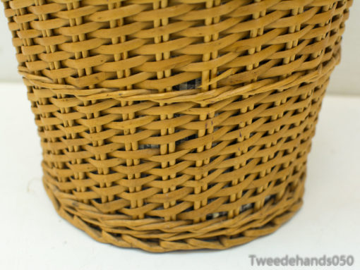Handwoven basket in warm tones, perfect for stylish storage and rustic home decor.