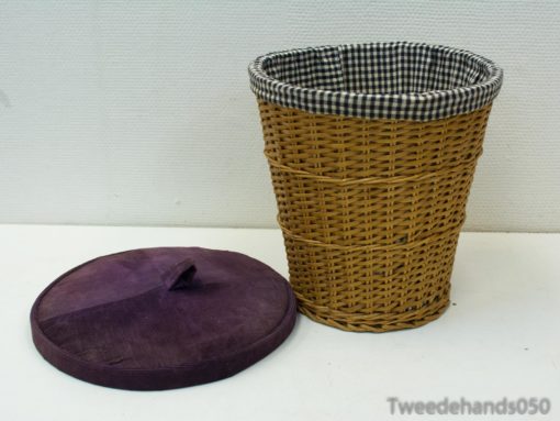 Chic wicker basket with purple lid and checkered lining for stylish home organization.
