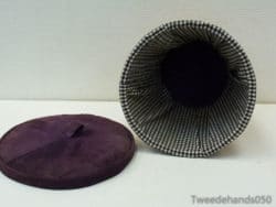 Chic purple storage box with checkered interior and lid, perfect for stylish organization.
