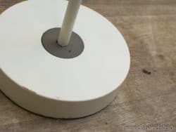 Sleek white lamp base with contrasting gray accents, adds charm to modern interiors.