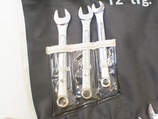 Three organized chrome wrenches (8mm, 10mm, 12mm) in a clear pouch for easy access.