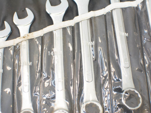 High-quality chrome wrench set (10-14mm) in clear holder for quick access and organization.