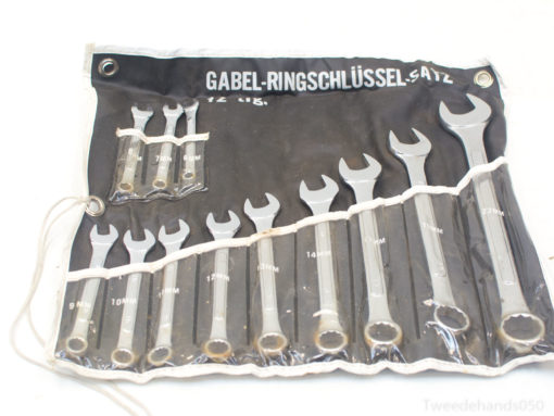 12-piece ring and open-end wrench set in organized black pouch for versatile use.