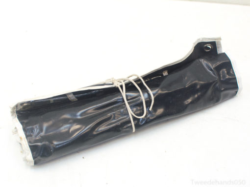 Sleek black cylinder for safely transporting delicate vintage items. Perfect for collectors and professionals.