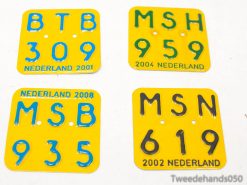 Vintage Dutch license plates (2001-2008) set for collectors, featuring vibrant colors and unique designs.