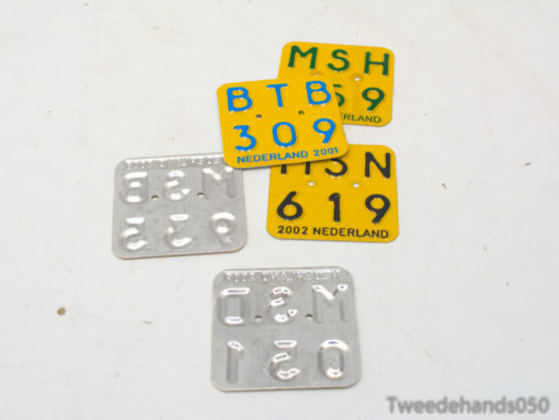 Vibrant Dutch license plates, 2001-2002, showcasing unique designs and history for collectors.