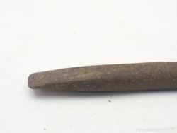 Rustic metal tool with a rich history, perfect for decor or practical applications.