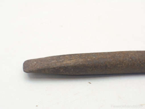 Rustic metal tool with a rich history, perfect for decor or practical applications.