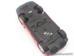 Vintage red 27 MHz RC car, perfect for outdoor racing adventures and young enthusiasts.
