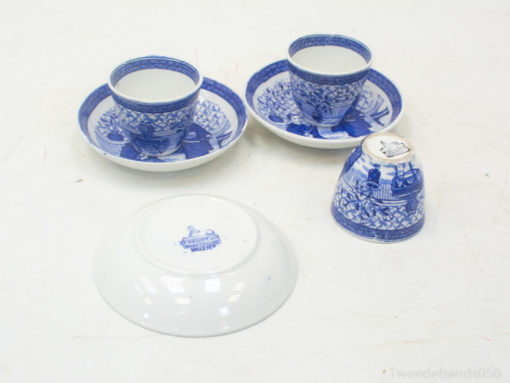 Elegant blue and white porcelain tea set with intricate traditional designs for stylish gatherings.