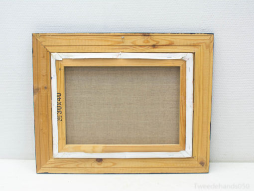 Rustic wooden frame with textured blank canvas, perfect for art projects and home decor.
