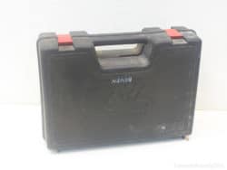 Sturdy black SKIL toolbox with ergonomic handle and red latches for secure tool storage.