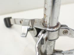 Vintage chrome clamp mechanism with wear, ideal for durable tool support and precision tasks.