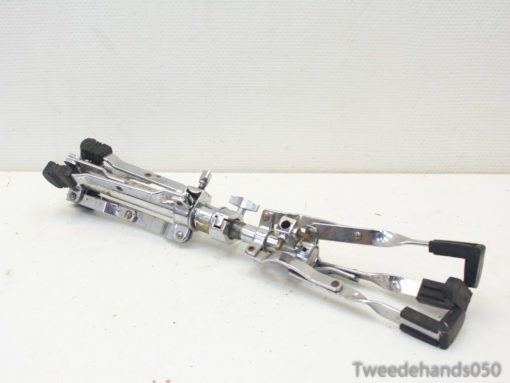 Adjustable chrome clamp with rubber grips for precision tasks in mechanics and automotive work.