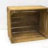 Rustic wooden crate for stylish decor and versatile storage solutions in any space.