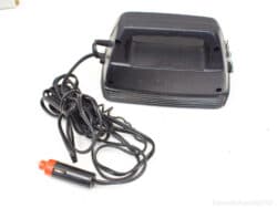 Compact car vacuum with ergonomic handle and long cord for convenient interior cleaning.