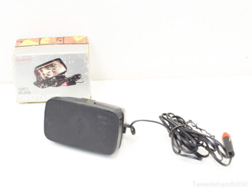 Vintage portable speaker with classic design and original packaging, ideal for audio collectors.