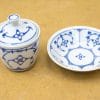 Elegant blue and white porcelain set with floral designs, ideal for dining and decor.