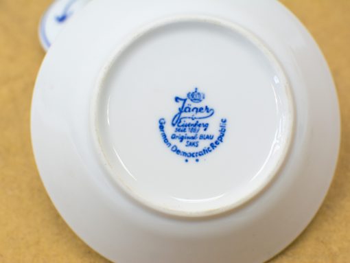 Antique Jäner porcelain saucer from Meissen, East Germany, featuring elegant blue craftsmanship.