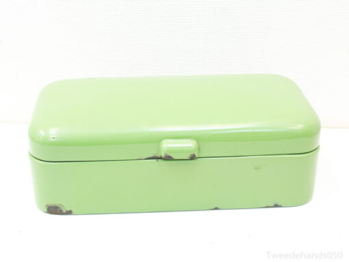 Charming vintage green storage box with wear, perfect for decor and keepsakes.
