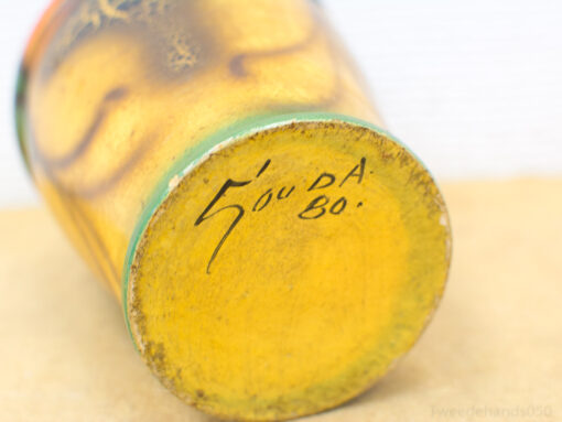 Handcrafted yellow vase from Gouda, 1980, with vibrant accents and unique artistic details.