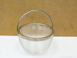 Charming vintage glass bucket with a metal handle, ideal for decor and serving treats.