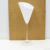Sleek conical cocktail glass with white interior, perfect for elegant dining and modern events.