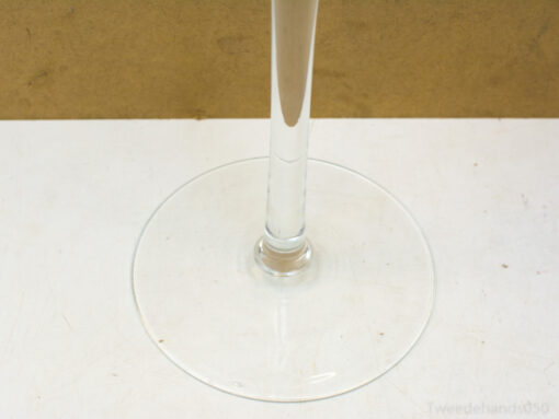 Clear elegant wine glass with a slender stem, ideal for special occasions and fine dining.