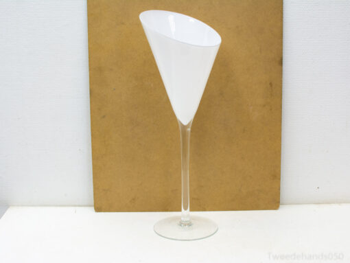 Sleek conical cocktail glass with white interior, perfect for elegant dining and modern events.