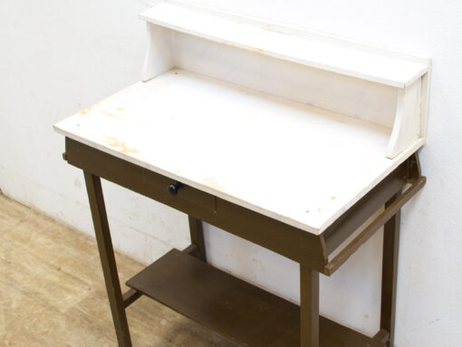 Charming vintage desk with drawer and shelf, perfect for stylish and functional workspaces.