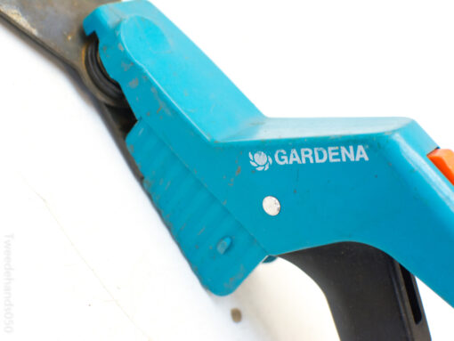 Ergonomic blue Gardena pruning shears for comfortable and stylish gardening experiences.