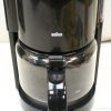 Sleek Braun coffee maker with glass carafe, perfect for brewing fresh coffee at home.