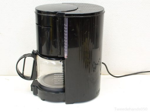 Vintage black coffee maker with glass carafe, brews six cups, ideal for modern kitchens.
