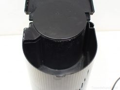 Stylish black ribbed kitchen container for efficient food prep and storage solutions.