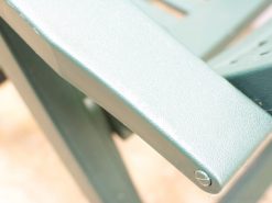 Sleek green armrest designed for comfort and elegance in outdoor chairs.