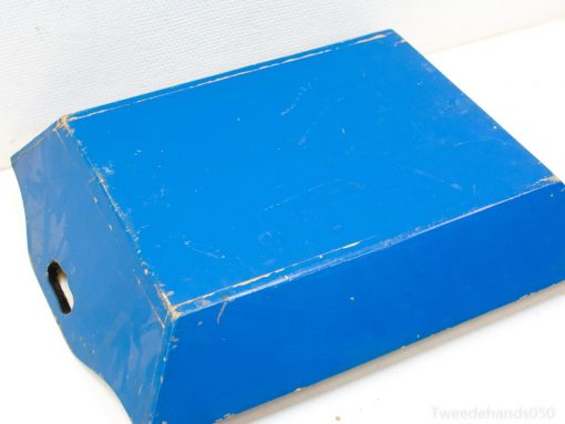 Vintage blue wedge with handle, perfect for creative projects and educational environments.