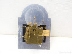 Vintage Franz Hermle clock mechanism with intricate brass gears and classic craftsmanship.