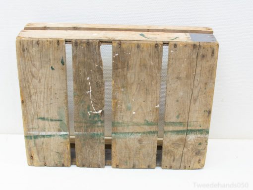 Weathered wooden pallet perfect for DIY projects and rustic home decor enhancement.
