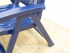 Vibrant blue Adirondack chair for stylish outdoor relaxation and comfort on patios and decks.