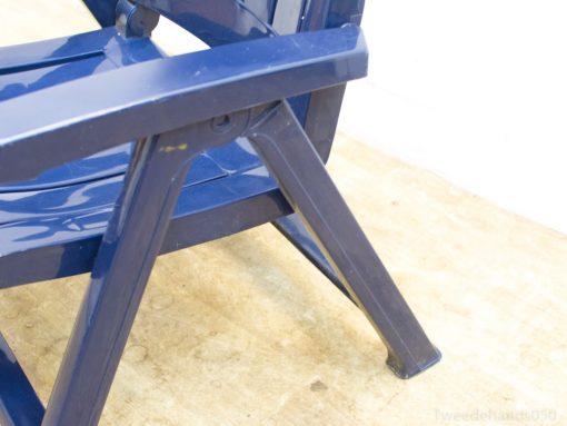 Vibrant blue Adirondack chair for stylish outdoor relaxation and comfort on patios and decks.