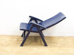 Navy blue ergonomic reclining chair for stylish comfort in indoor and outdoor settings.