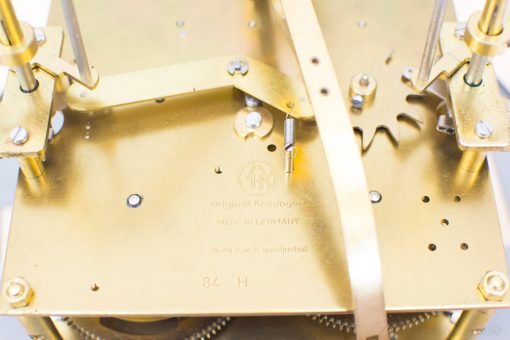 Kieninger brass clock mechanism: a blend of elegance, craftsmanship, and German engineering excellence.