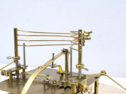 Kieninger brass clock: exquisite craftsmanship with intricate mechanics for design enthusiasts and collectors.