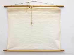 Elegant blank scroll for artistic expression and inspiration in any creative space.