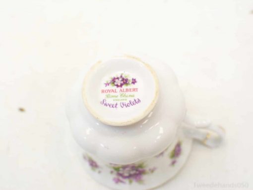 Elegant Royal Albert Sweet Violets teacup, featuring a floral design and gold accents.