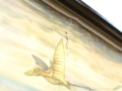 Vibrant vintage pterosaurus painting in flight, highlighting artistic history with a unique crack.