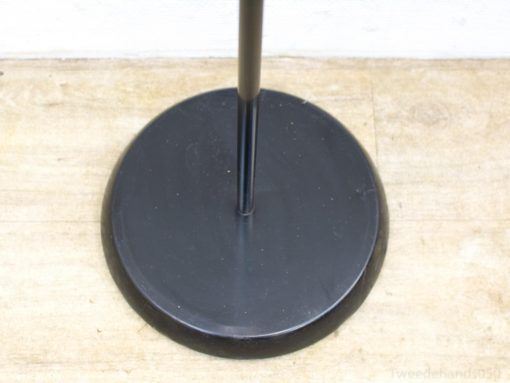 Elegant black metal stand with round base, perfect for modern displays in any setting.