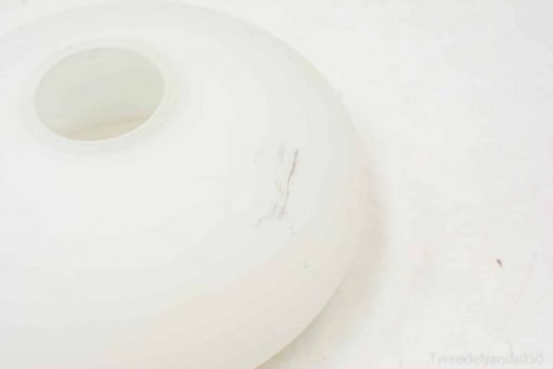 Frosted disk with unique scratch, perfect for modern decor and soft light diffusion.