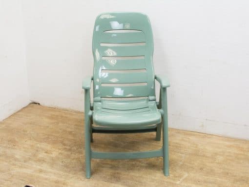 Versatile mint green chair for stylish comfort in indoor and outdoor settings.